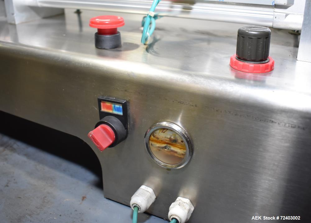 Used Wenzhou Rigao Table Top Semi Automatic Piston Filler, Model DYF. 316L Stainless steel product contact. Filling speed 5 to 20 bottles per minute. Filling accuracy /= 1% +/-. Filling range: approx...